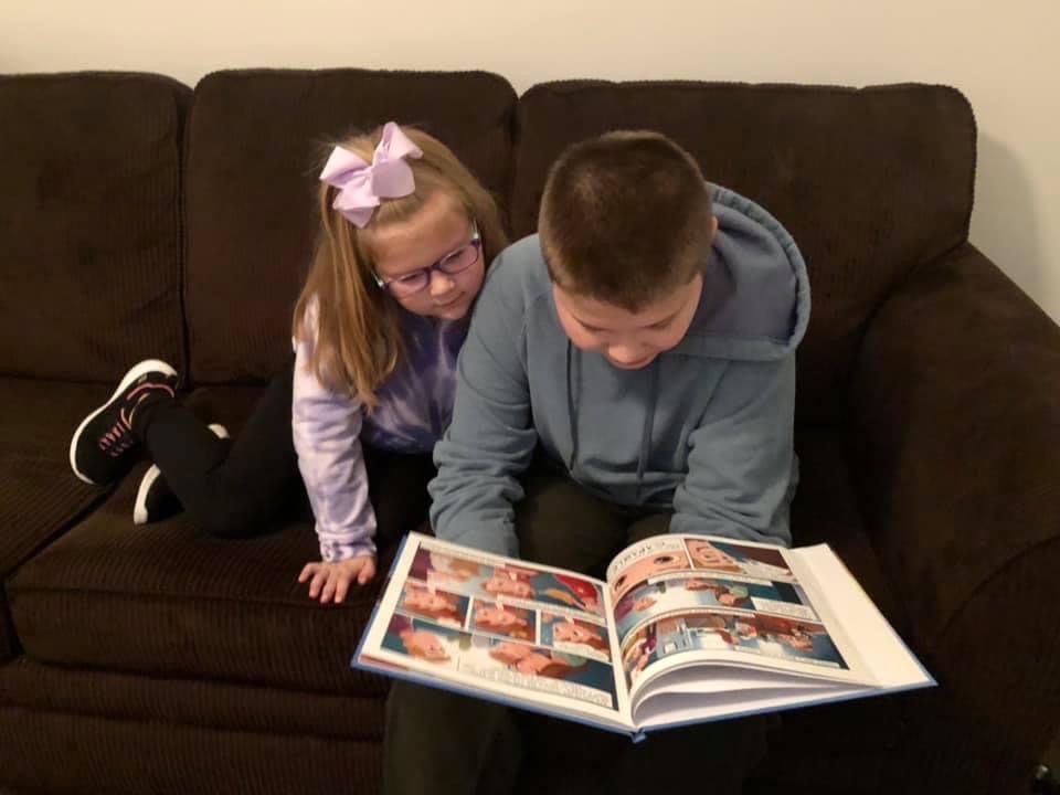 Kids reading The Capables